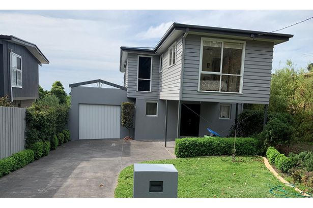 Newly decorated and painted grey house.