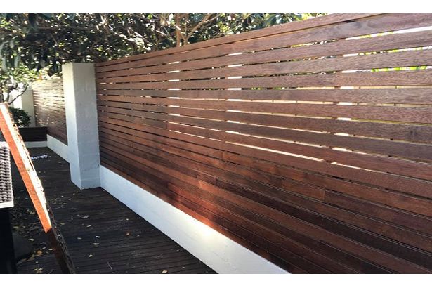 Professionally painted fence.